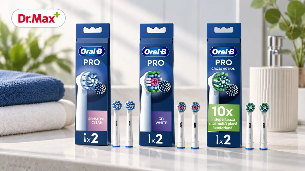 Trei pachete Oral-B Pro cu rezerve pentru periuță și capete alături, pe blat de baie, cu logo Dr. Max.