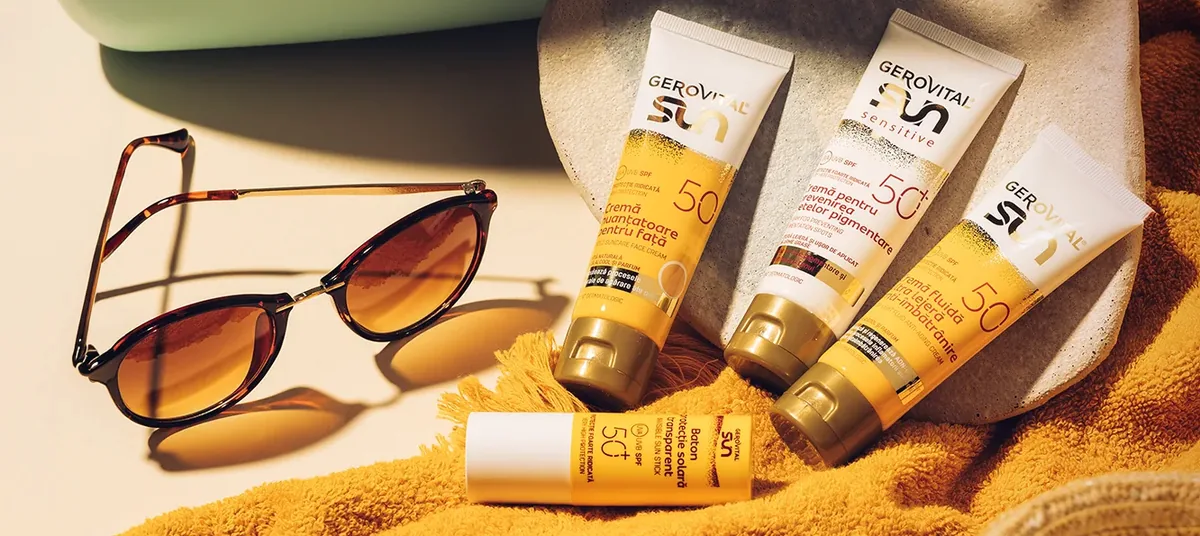 Creme gerovital la promotie pe o plaja langa niste ochelari de soare