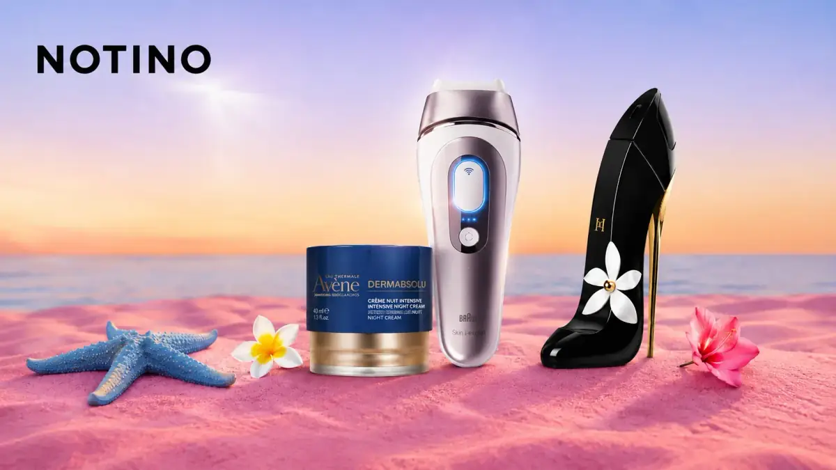 Reduceri Notino la produse de frumusețe selectate, cu cremă Avène, aparat Braun și parfum Carolina Herrera pe fundal roz de vară.
